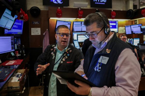 Stocks making the biggest moves premarket: NFLX, AXP, CVX, SRPT