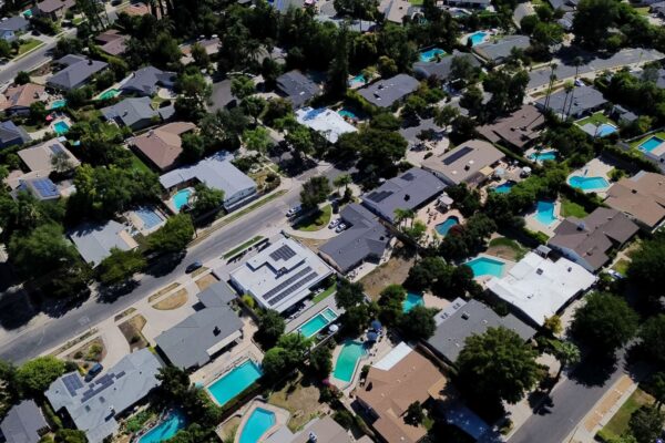June home sales drop as prices hit a record high