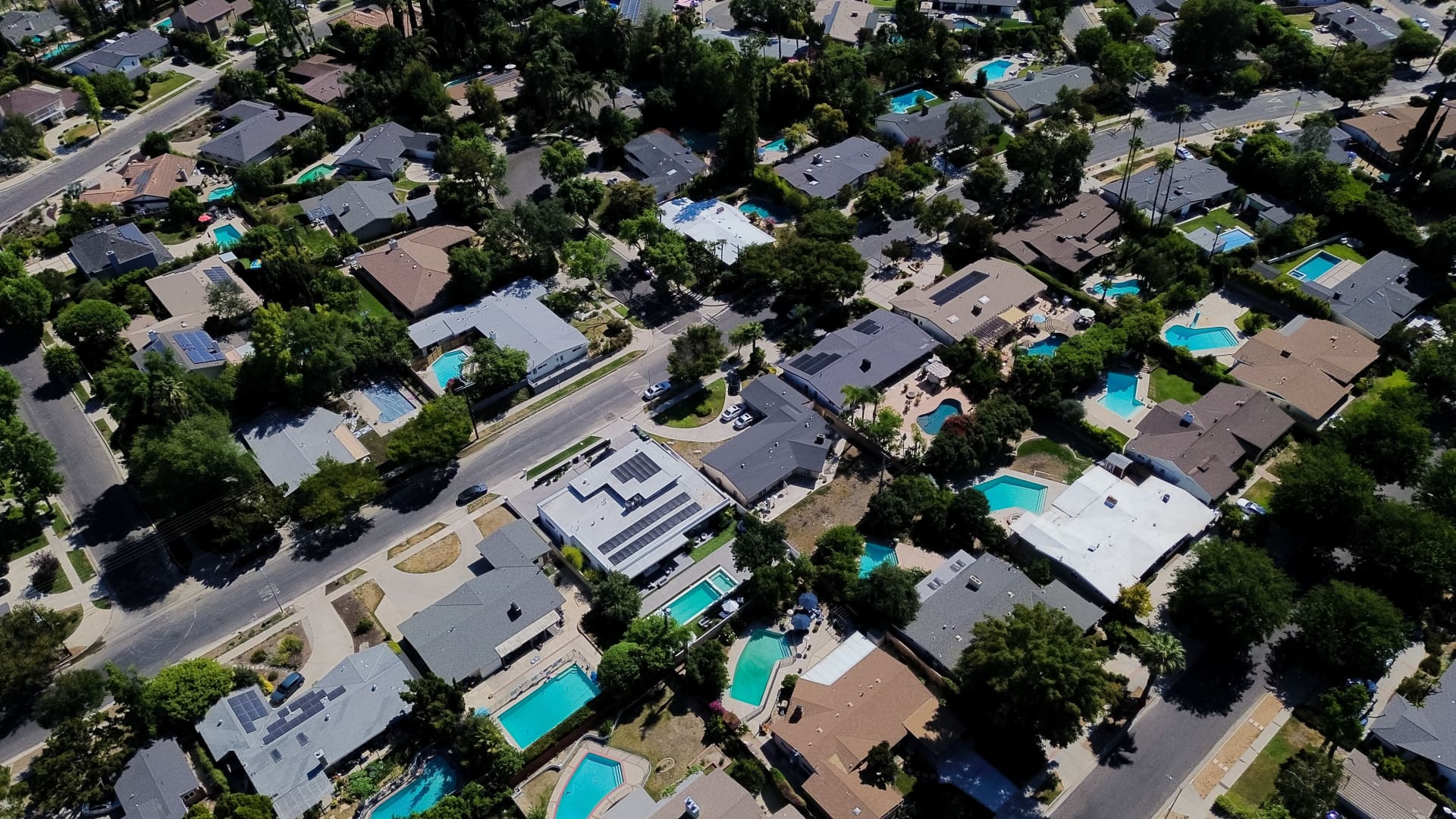 June home sales drop as prices hit a record high