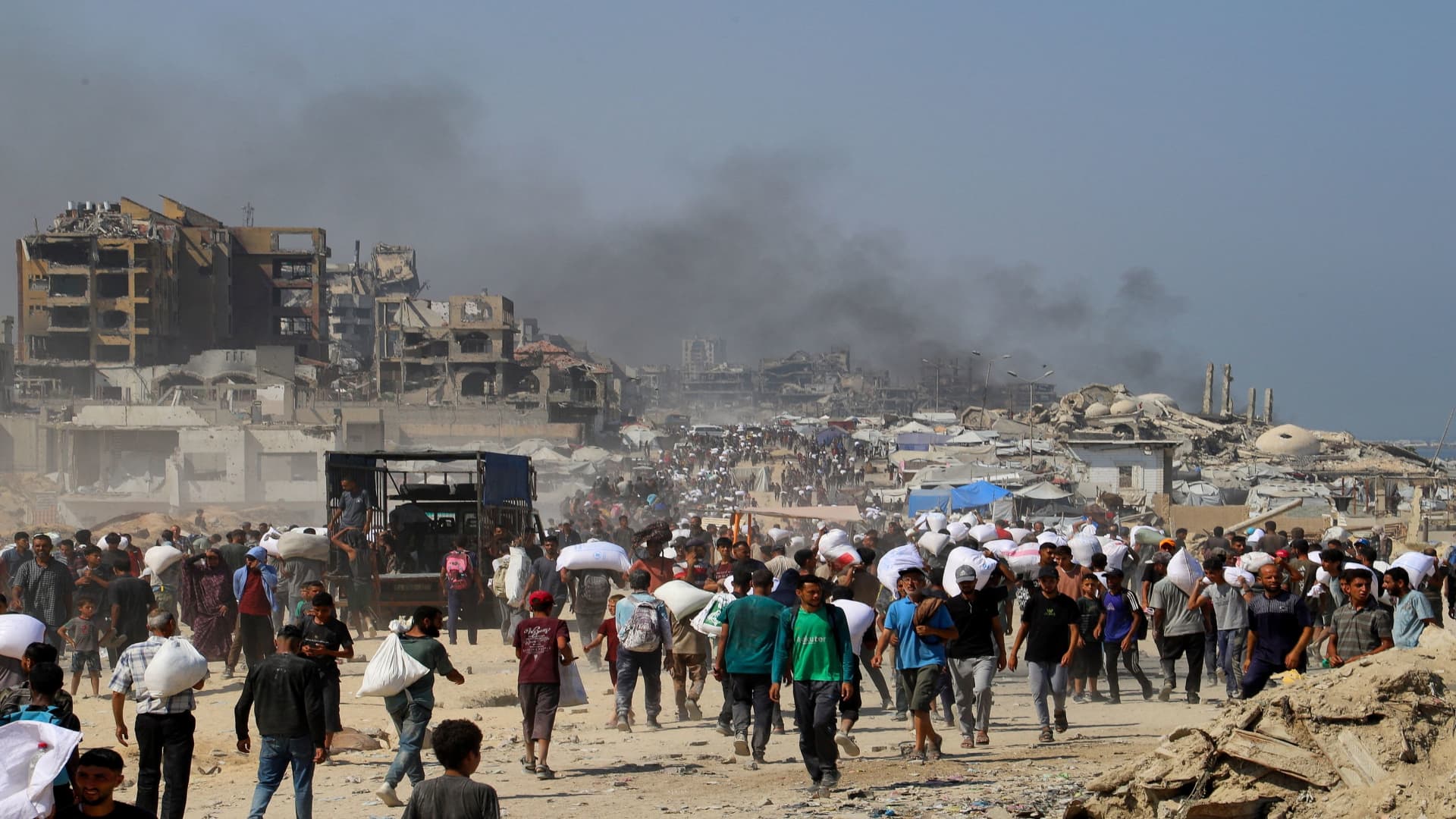 Israel announces ‘tactical pause’ in Gaza fighting after outrage over starving Palestinians