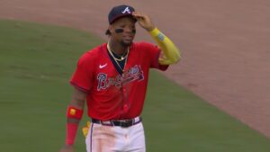 Braves' Ronald Acuña makes incredible throw to tag out Yankees' runner at third base.