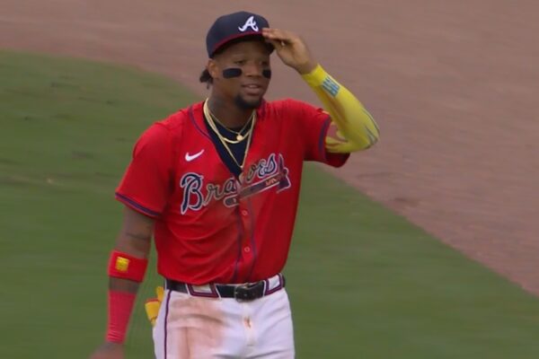 Braves' Ronald Acuña makes incredible throw to tag out Yankees' runner at third base.