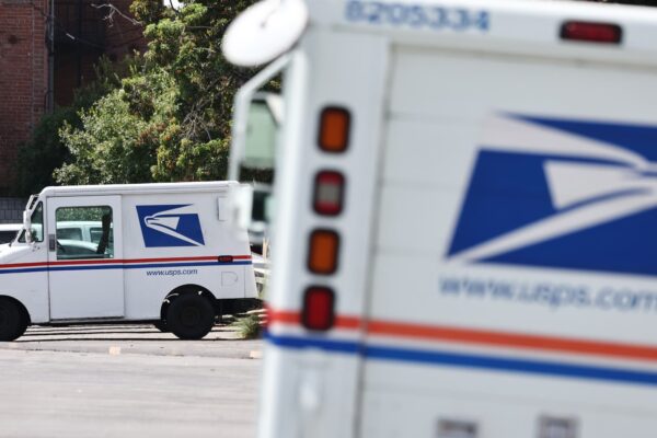 Global mail carriers suspend U.S. deliveries