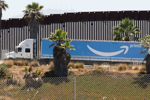 Stocks making the biggest moves premarket: AMZN, COIN, RDDT, AAPL