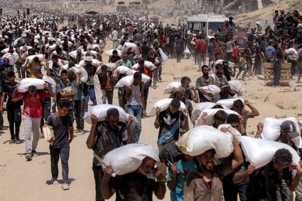 Satellite images show Israel building up forces for a possible ground invasion of Gaza, sources say