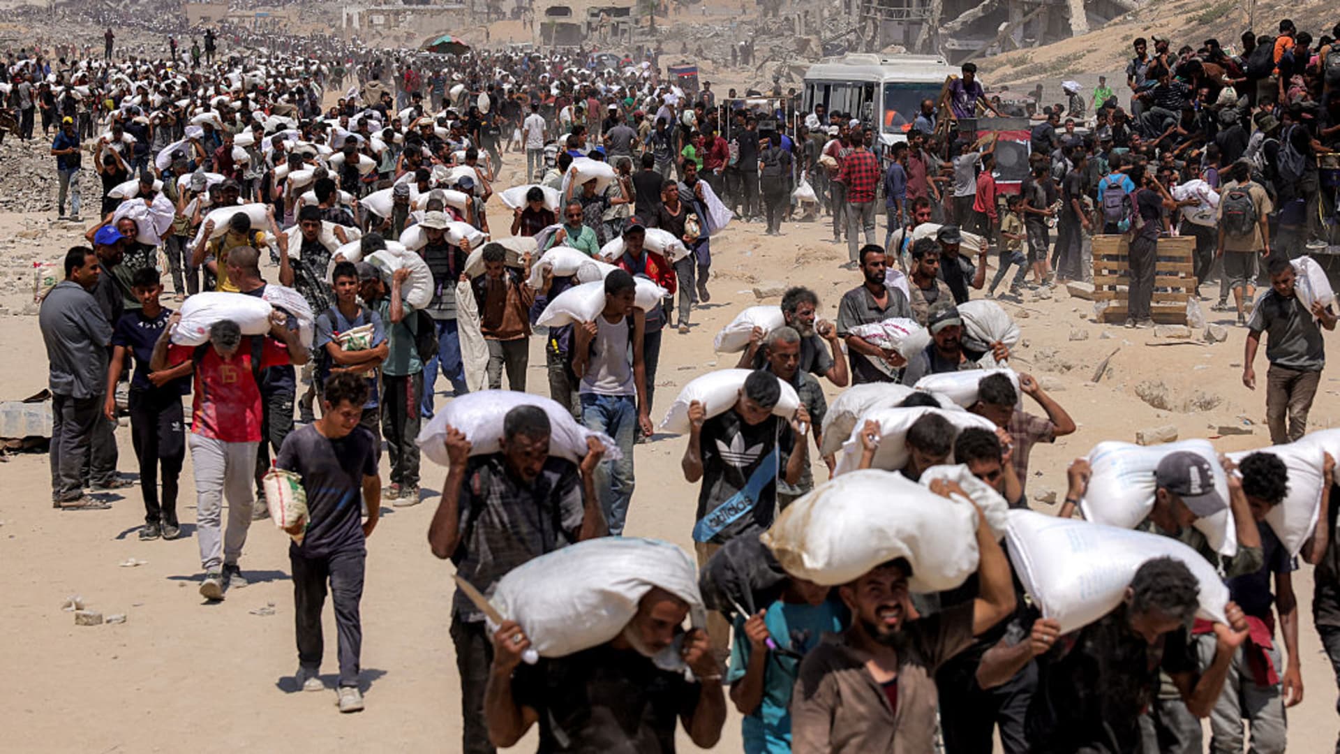 Satellite images show Israel building up forces for a possible ground invasion of Gaza, sources say