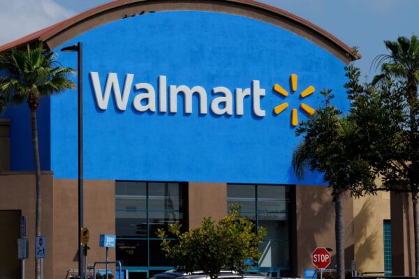 Walmart suspends H-1B visa job offers after Trump fee hike Walmart suspends H-1B visa job offers after Trump fee hike