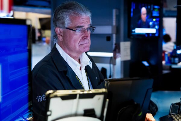 Traders see a chance the Fed cuts by a half point