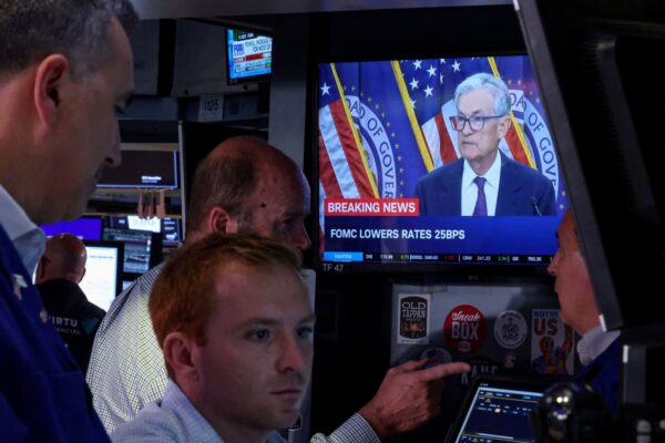 Stock market records, Fed rate cut, trades, and new iPhones