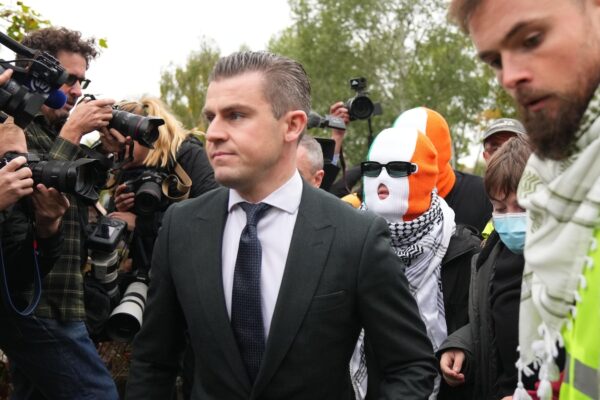 British court throws out terror-related charge against hip-hop group Kneecap member