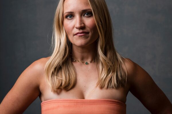 Actor Emily Osment is single as her divorce from musician Jack Farina becomes official