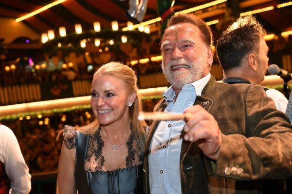 Schwarzenegger directs a band in a beer tent at Munich’s Oktoberfest