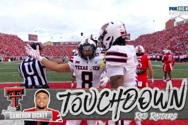 Cameron Dickey punches in the short TD, giving Texas Tech an early lead over Utah