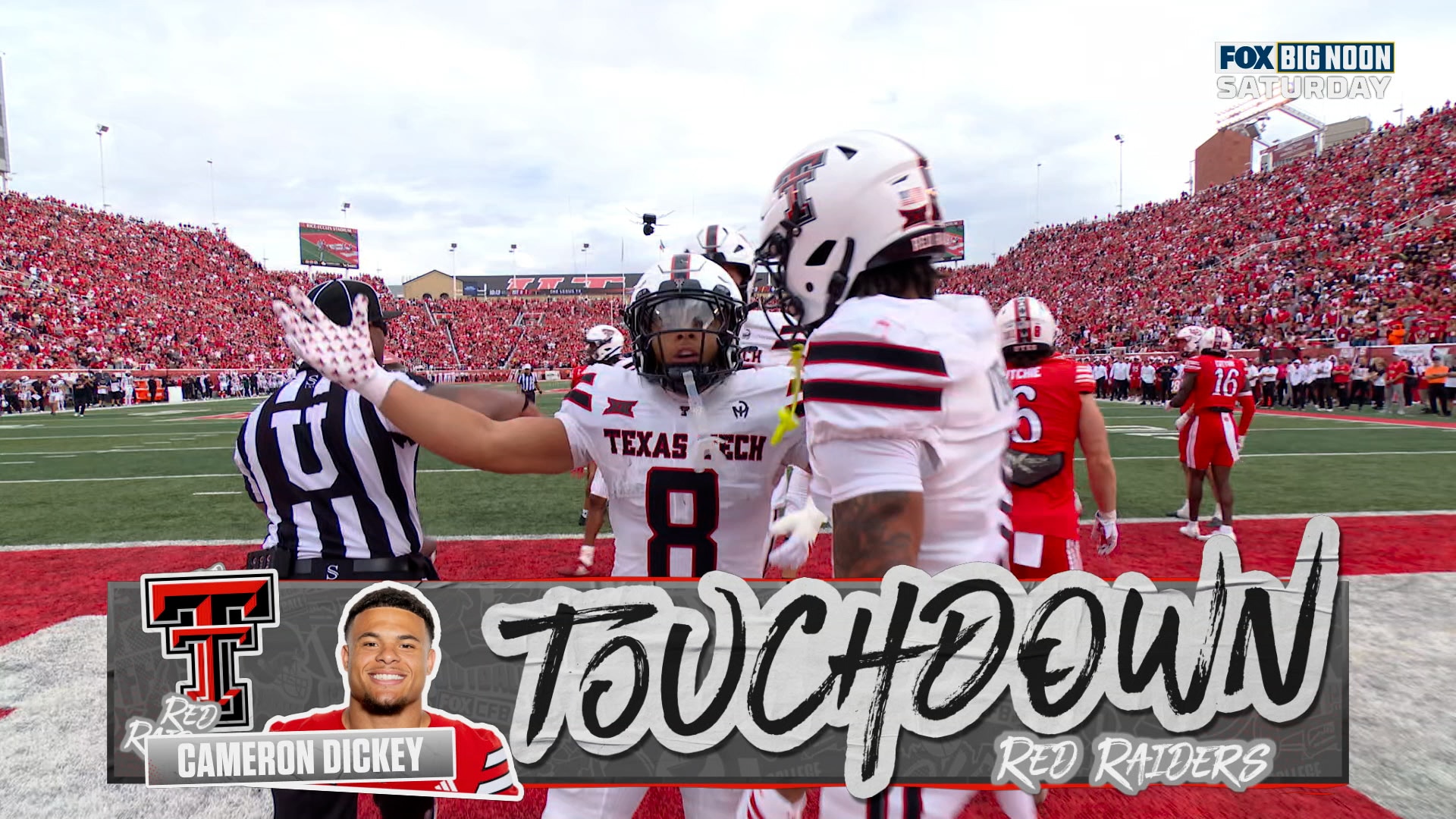 Cameron Dickey punches in the short TD, giving Texas Tech an early lead over Utah
