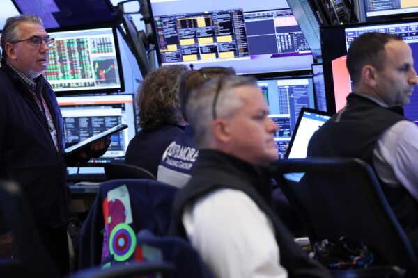 Stocks pull back from record highs as Wall Street takes a breather