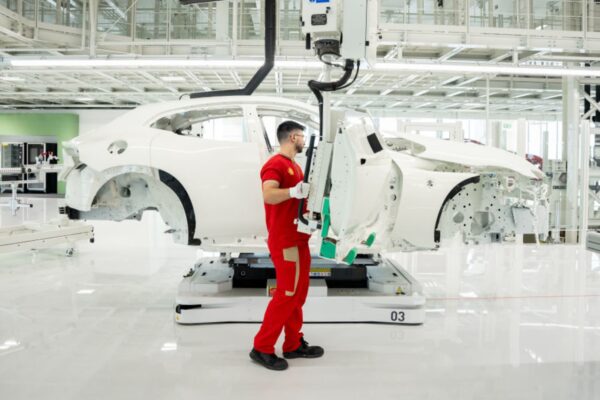 Ferrari unveils first electric vehicle and cuts 2030 EV sales target