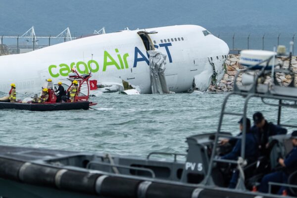 Cargo plane slides off runway falls into sea in Hong Kong