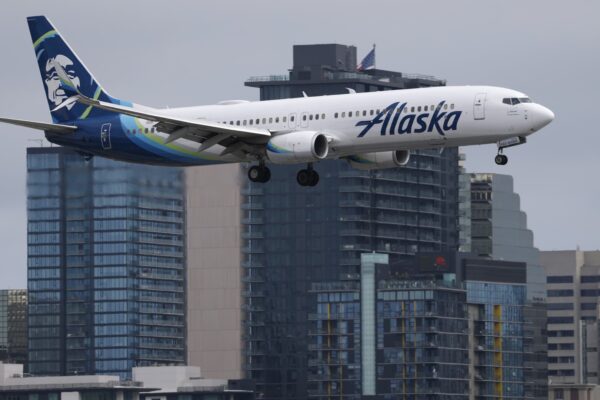 Alaska Air cuts annual profit forecast on higher fuel costs Alaska Air cuts annual profit forecast on higher fuel costs