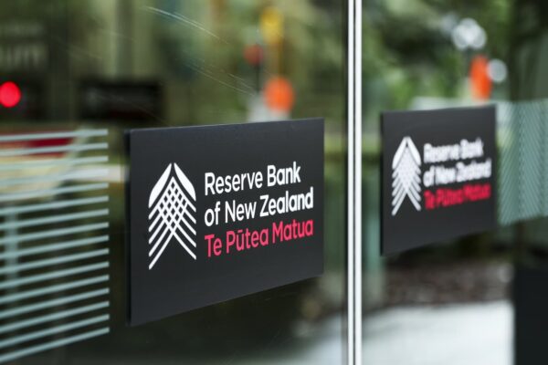 New Zealand central bank cuts rates to over 3-year low, signals end to easing cycle