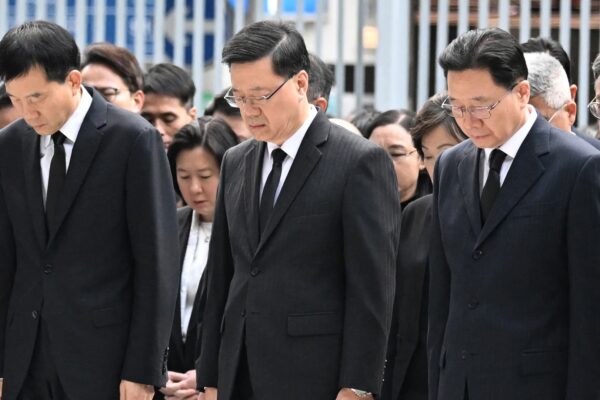 Hong Kong mourns victims of blaze that killed 128 and counting