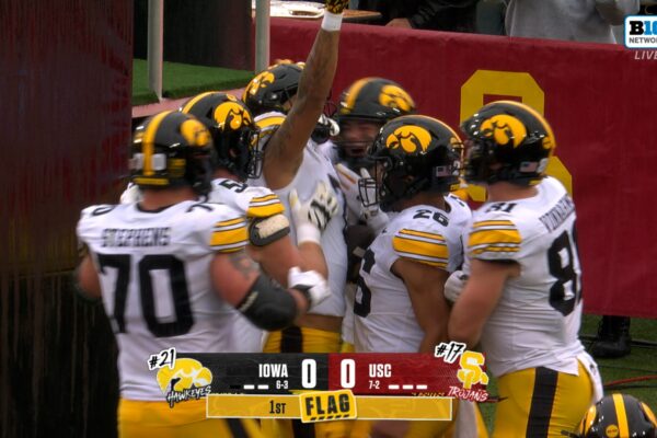 Gronowski floats it in the endzone to connect with Dayton Howard for an early Iowa lead