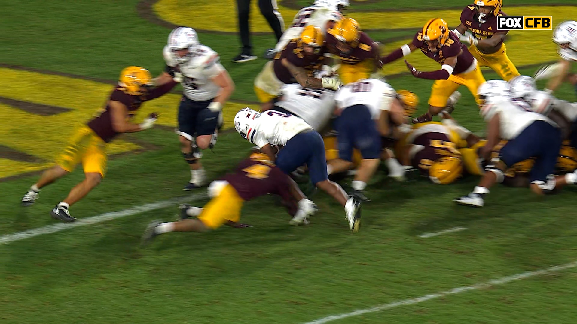 Arizona's Kedrick Reescano punches it in from one yard for the TD, extending lead over Arizona State