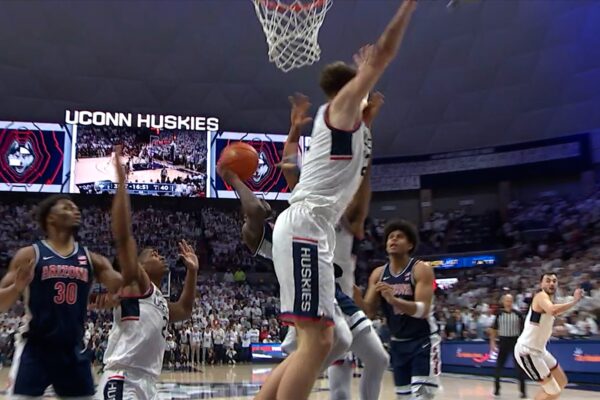 Jaden Bradley drives left and finishes TOUGH and-1, increasing Arizona's lead over UConn