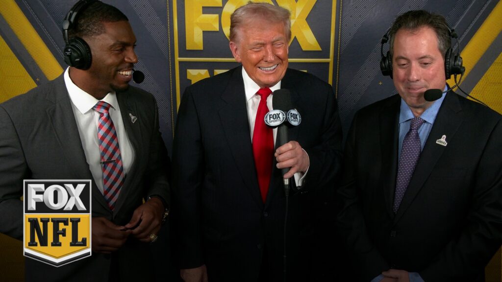 President Donald Trump joins Kenny Albert and Jonathan Vilma in the broadcast booth in Washington