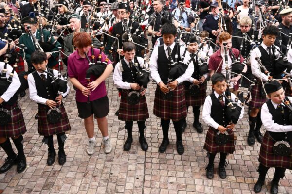 Bagpipers claim world record with AC/DC’s ‘It’s a Long Way to the Top’