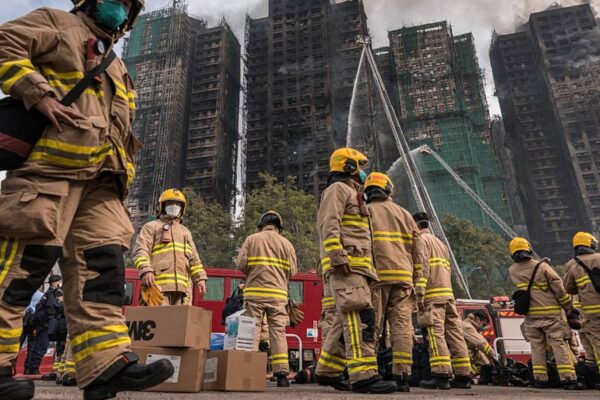 Police comb fire-ravaged Hong Kong apartments, death toll at 146