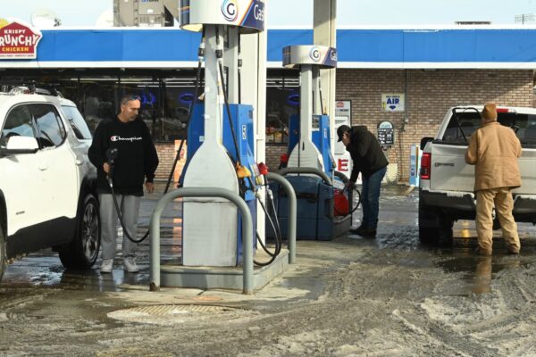 AAA says a gallon hits 4-year low as holiday travel starts