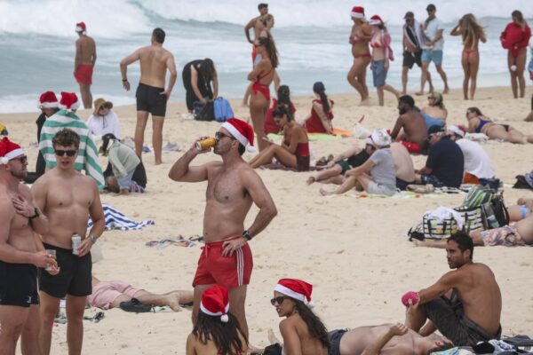 Christmas celebrations muted at Bondi as Australians grieve after deadly shooting