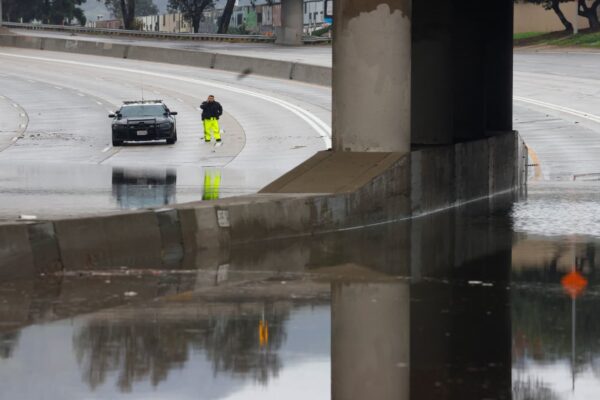 Rain-soaked California still at risk of floods and high surf