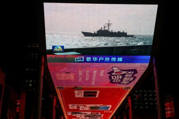China encircles Taiwan in massive military display