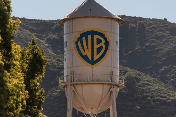 Paramount goes hostile in bid for Warner Bros., challenging a B bid by Netflix