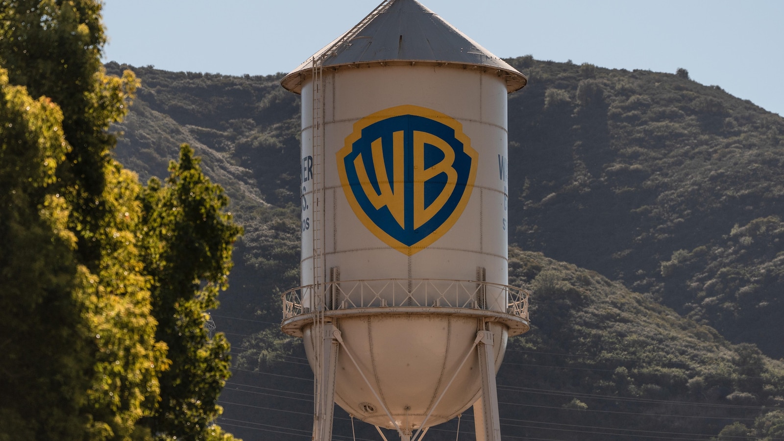Paramount goes hostile in bid for Warner Bros., challenging a B bid by Netflix