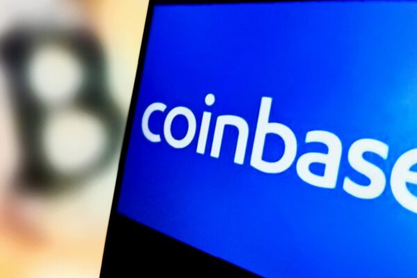 Stocks making the biggest moves midday: COIN, ANET, CVX, HAL