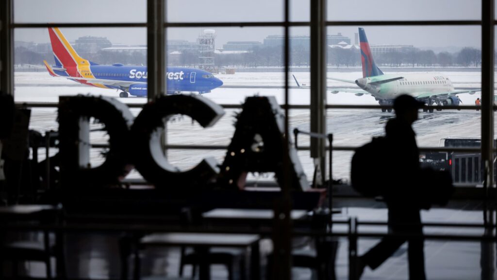 Airlines cancel hundreds of flights as massive winter storm sweeps across U.S.