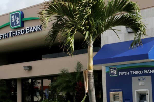 Dividend growth stocks offer attractive returns and less risk, per Nuveen