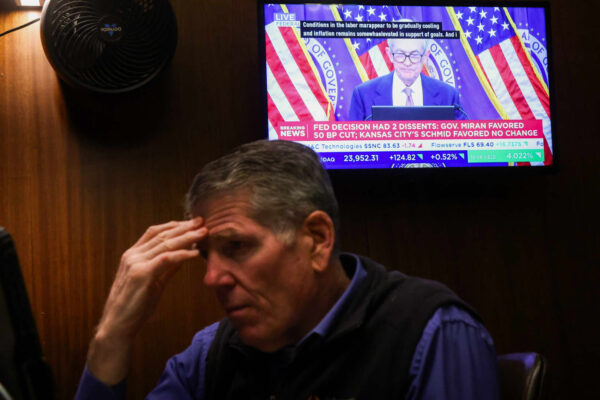 Investors look past Powell probe