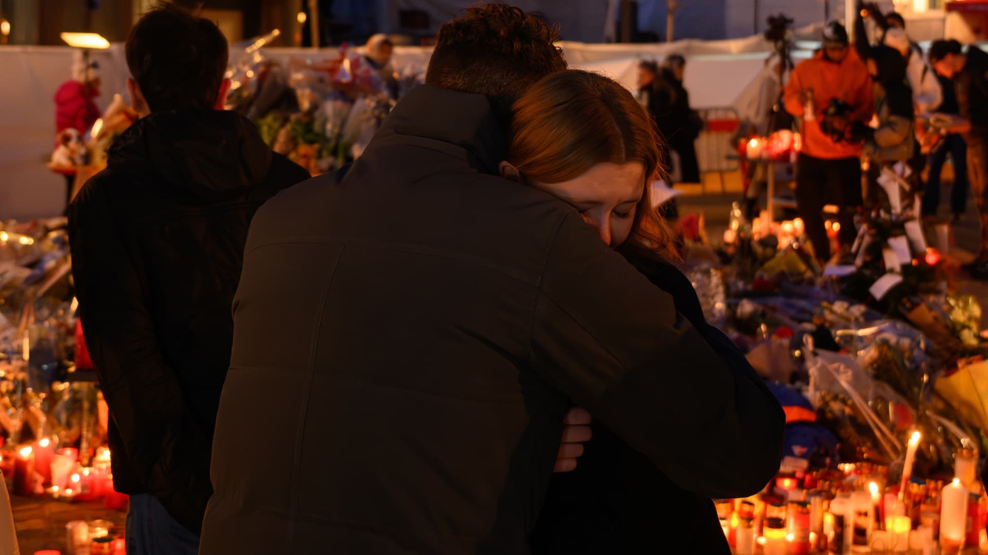 Stunned Swiss Alpine resort seeks solace together after deadly bar fire