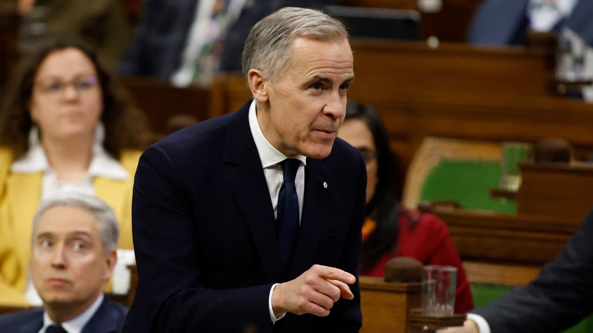 Carney defends Davos remarks after Bessent said he walked them back