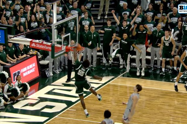 Michigan State's Coen Carr takes flight with POWERFUL fastbreak dunk vs. Northwestern