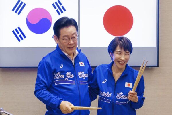 Japanese and South Korean leaders jam to K-pop hits at a summit