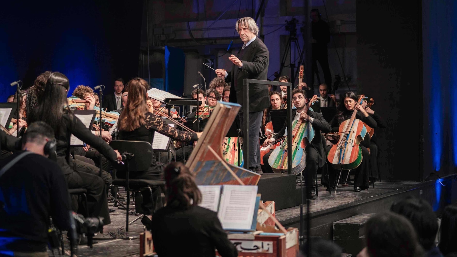 Milan prison hosts concert with instruments made by inmates from migrant smugglers’ boats