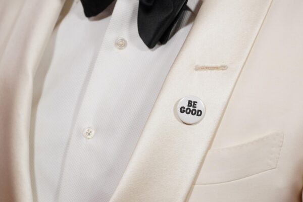 Celebrities wear pins protesting ICE at the Golden Globes