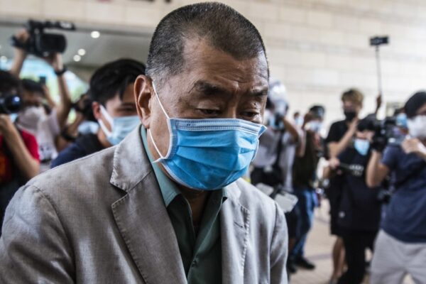 Hong Kong media tycoon Jimmy Lai arrives at day of sentencing