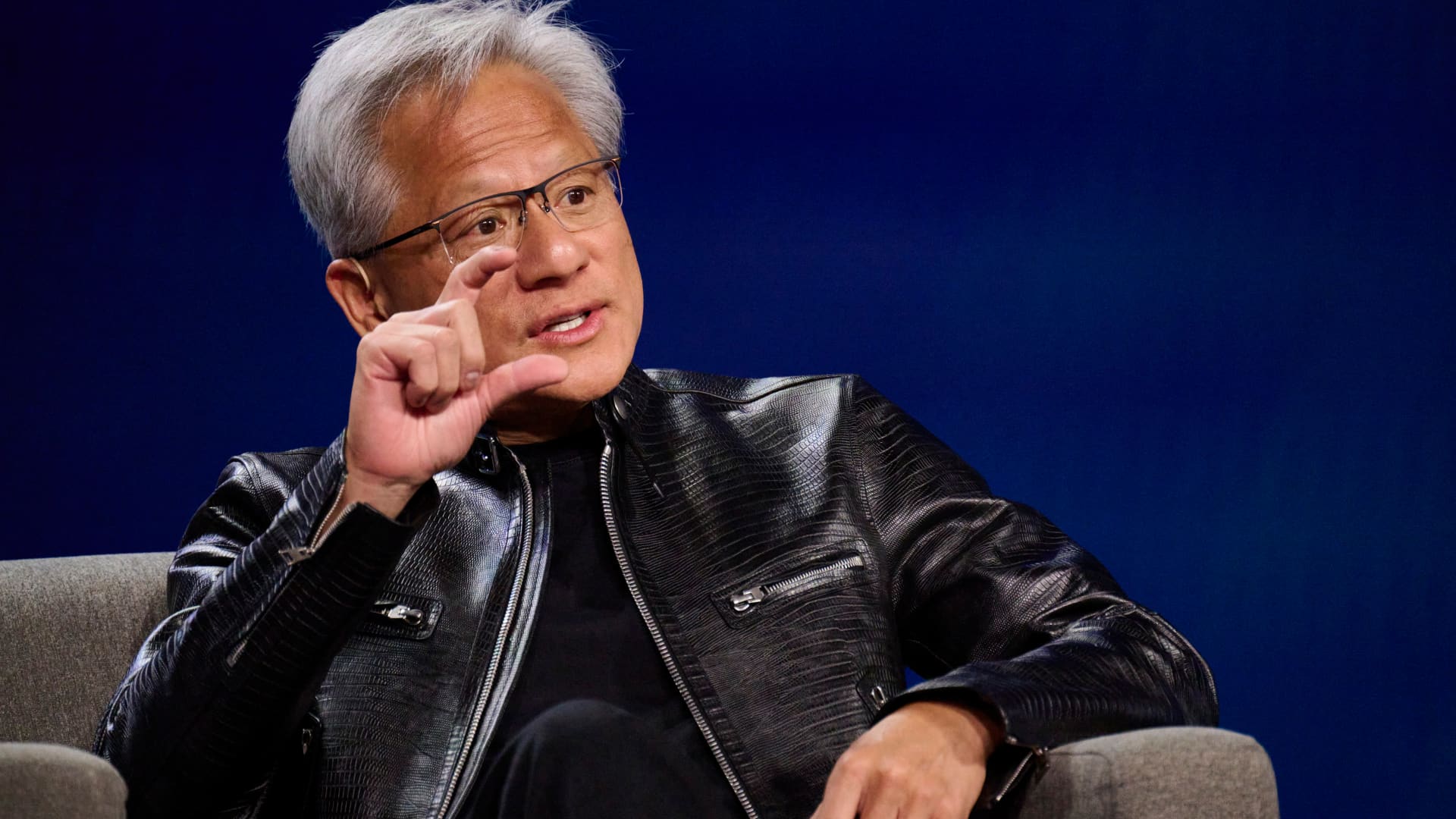 Nvidia denies rift with OpenAI, while software and asset management stocks plunge