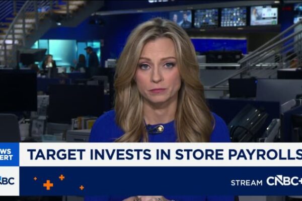 Target steps up investment in store staffing, cuts about 500 other roles