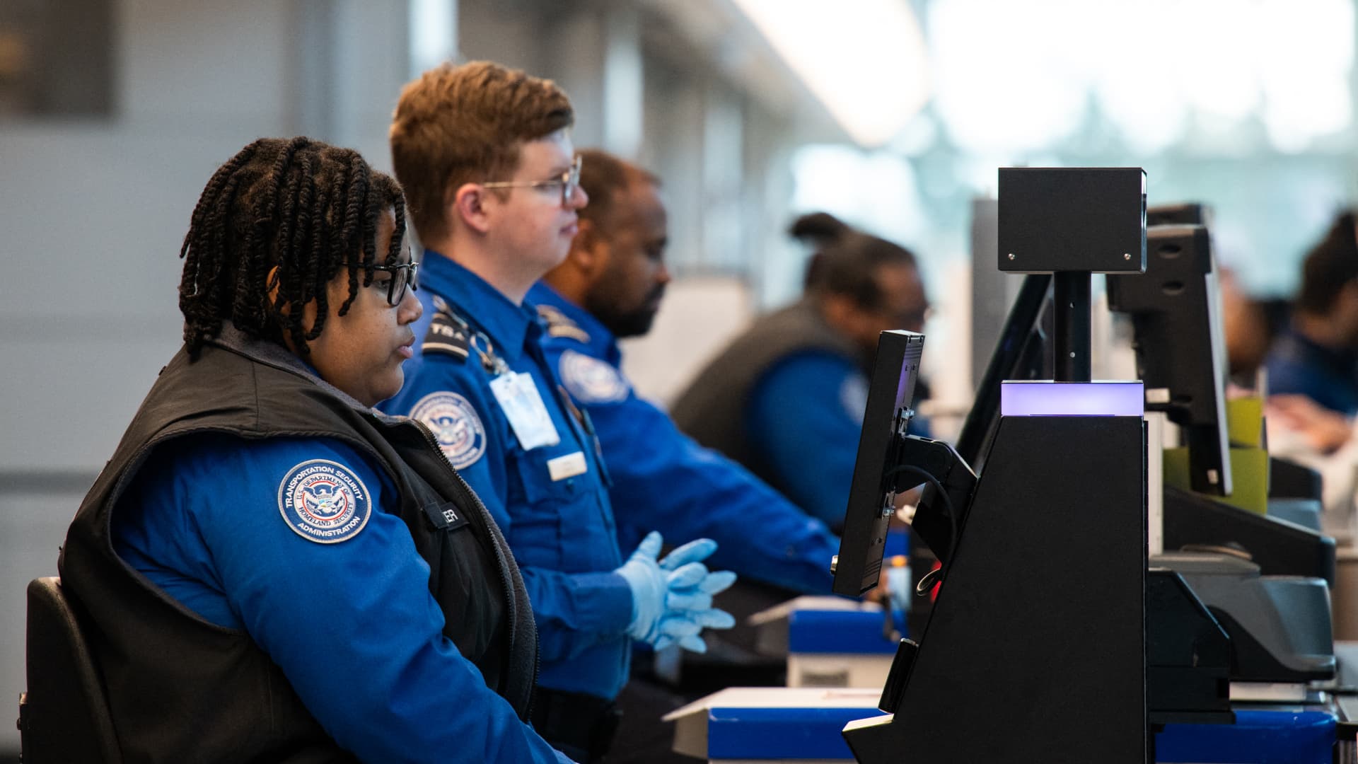 TSA officers will start getting paychecks as early as Monday, DHS says